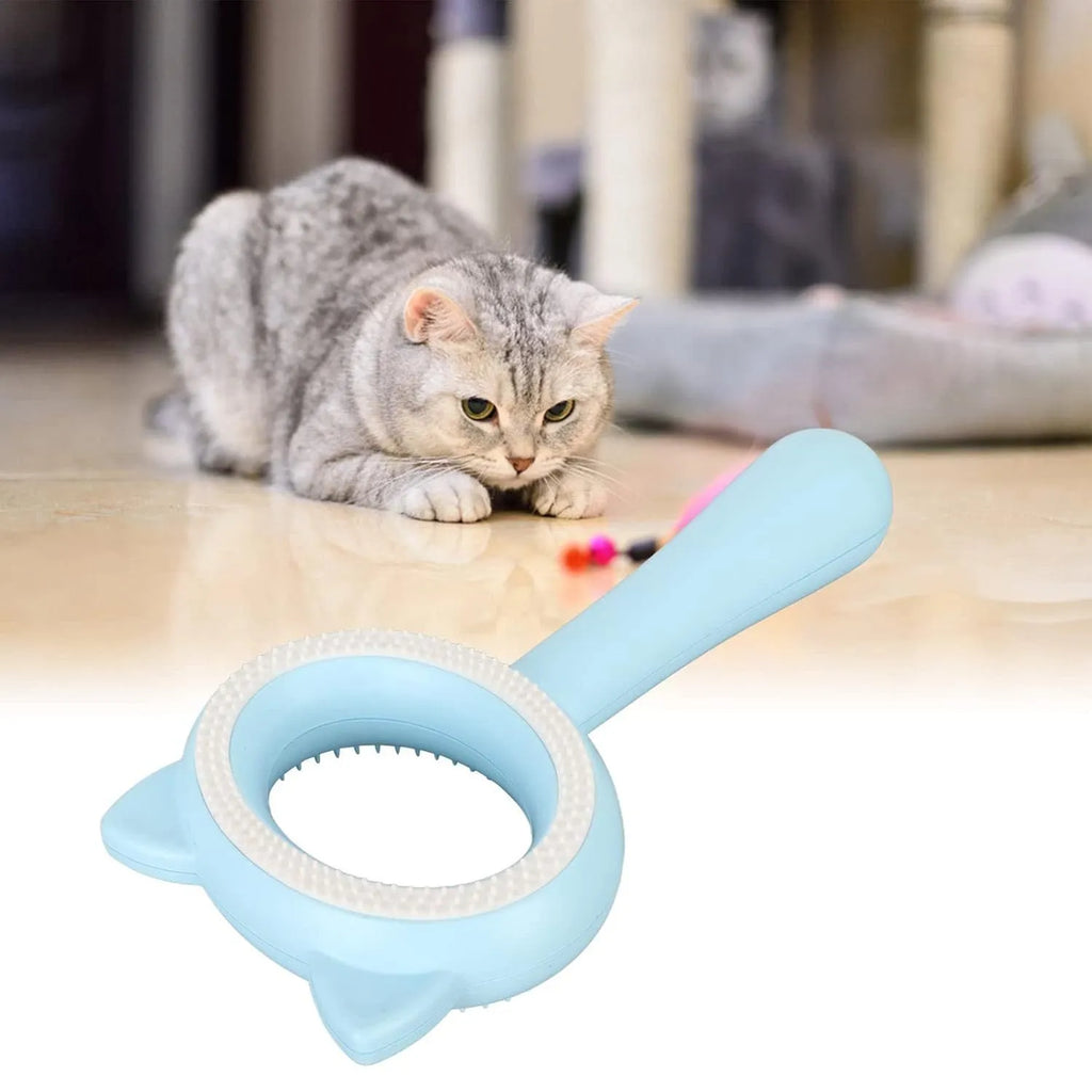 Blue and white double-sided pet grooming brush with an ergonomic handle for cats and dogs.