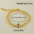 Copper bracelet with heart-shaped Arabic design and single zircon centrepiece on white background