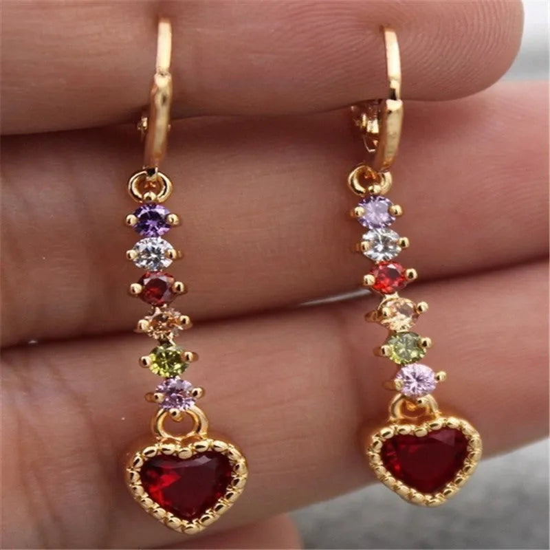 Women's heart-shaped fashion earrings in gold or silver electroplated alloy