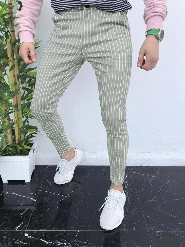 Men's slim-fit straight-leg casual trousers in a grey 3D printed plaid pattern, showing front view.