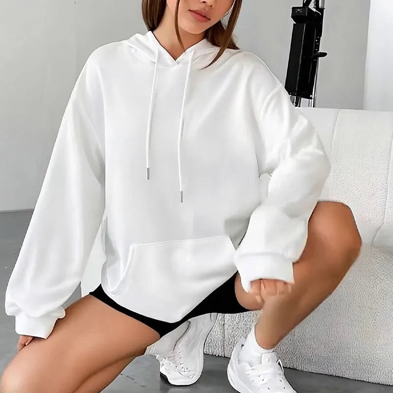 Women's loose grey drawstring pocket sweatshirt with long sleeves on a hanger.