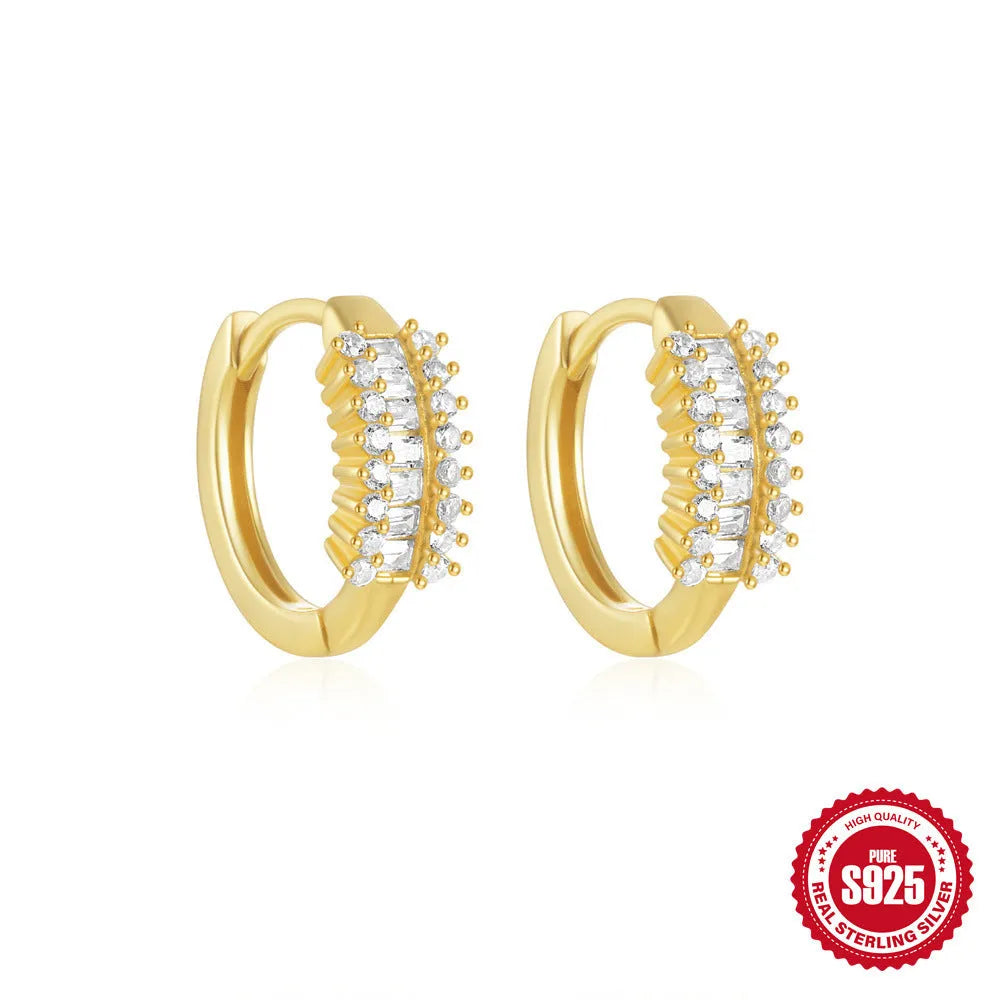 Sterling silver geometric stud earrings with diamond accents in gold or silver electroplated finish
