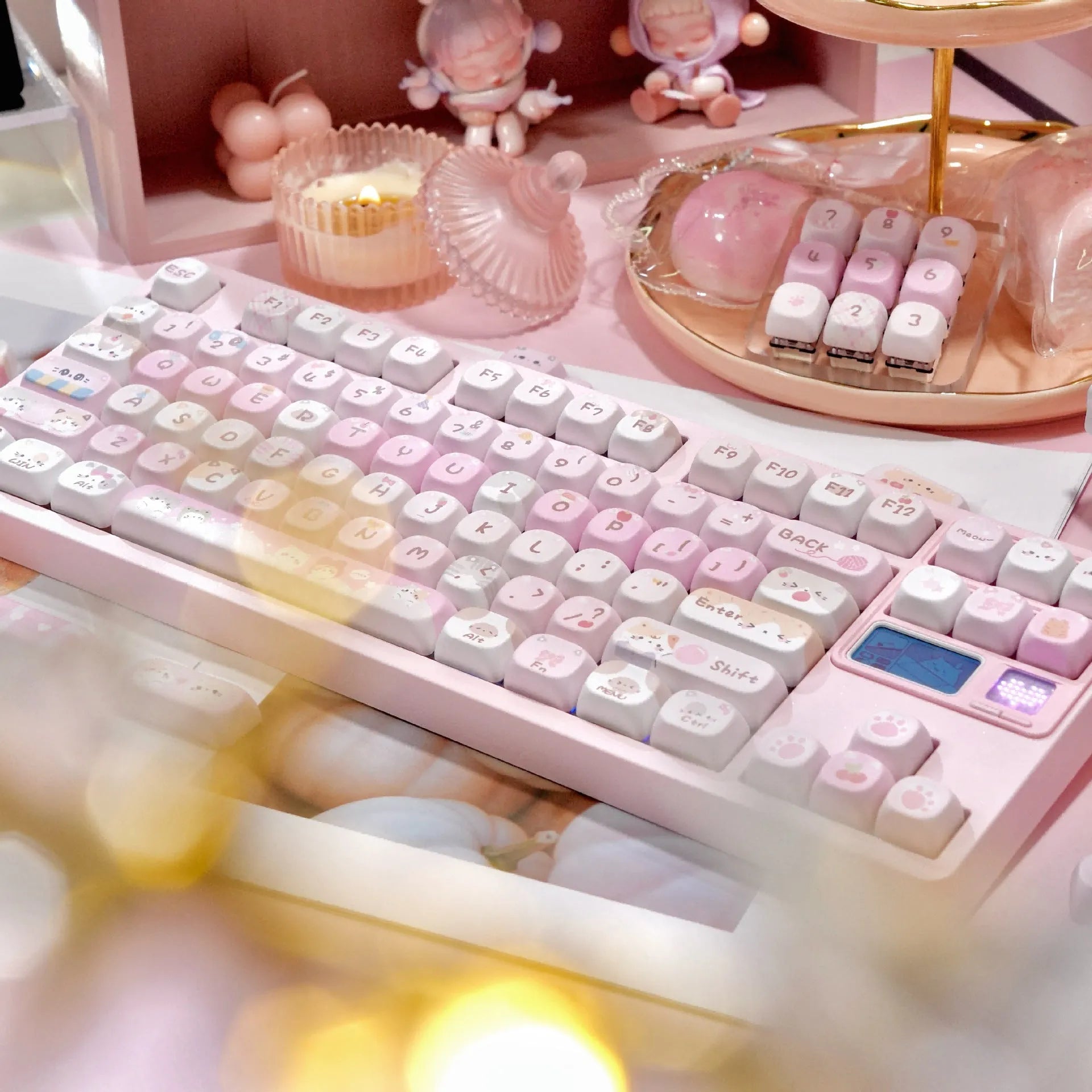 Set of pink cartoon character keycaps for mechanical keyboards with design on all sides.