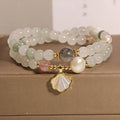 Women's crystal bracelet with Tianshan jade ginkgo leaf pendant and gold-plated gemstone settings
