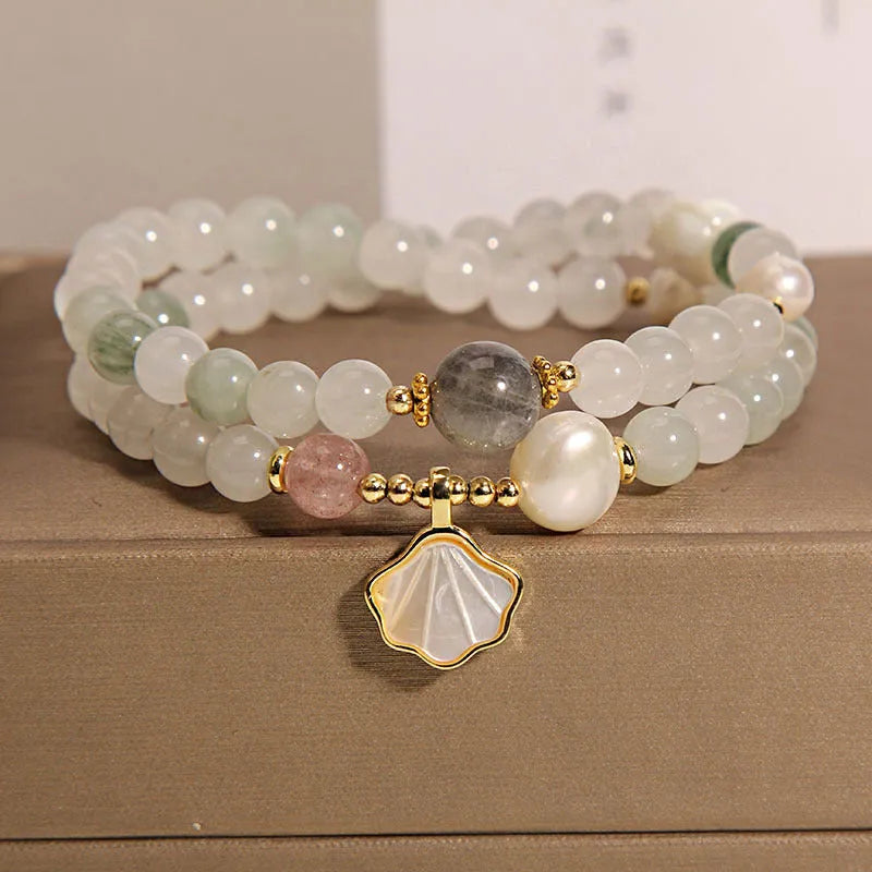 Women's crystal bracelet with Tianshan jade ginkgo leaf pendant and gold-plated gemstone settings