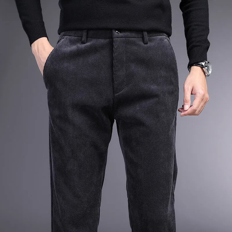 British retro striped straight-leg trousers in a chemical fibre blend, showing zip placket detail.