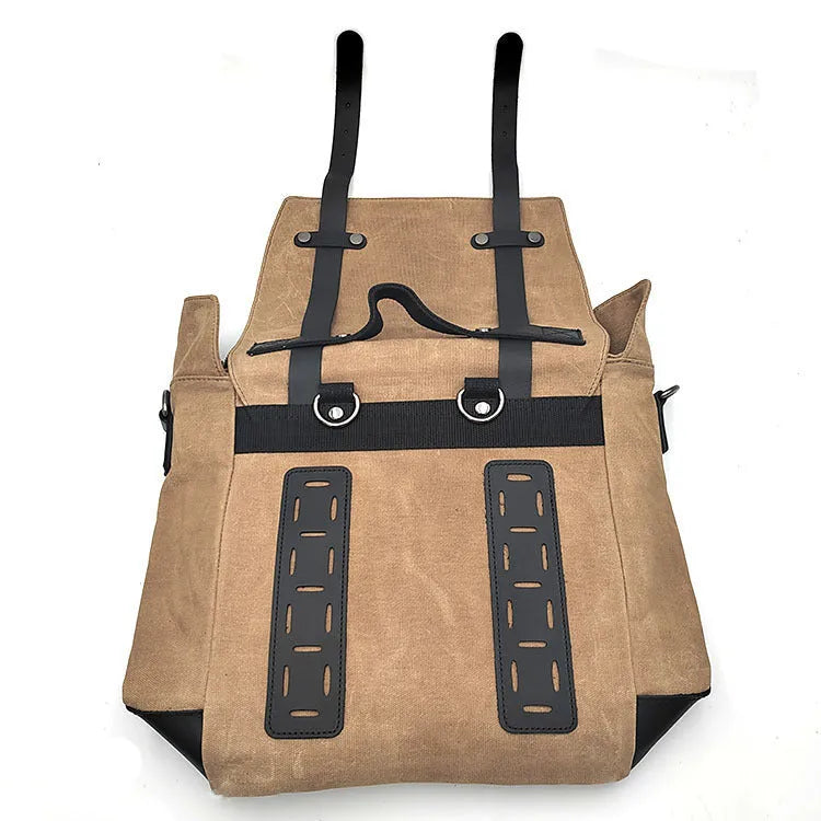 Black waterproof canvas motorcycle side pannier bag with cowhide reinforcement mounted on motorcycle