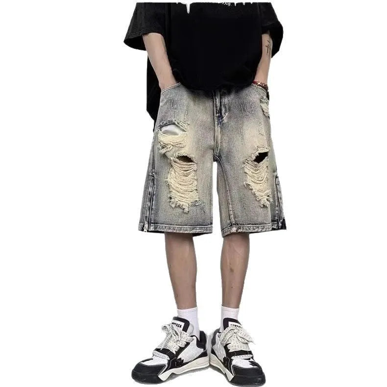 Blue retro-style women's denim shorts with a wide-leg loose fit and tattered detailing.