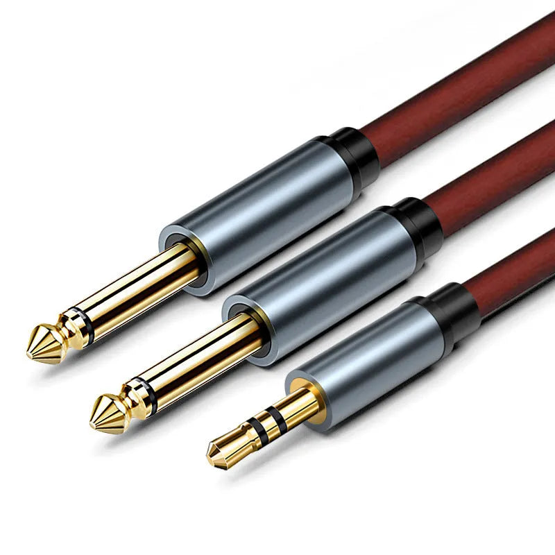 3.5mm stereo to dual 6.5mm mono male audio cable on a white background.