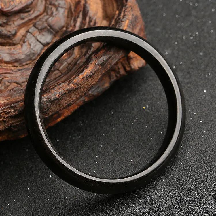Natural silver stone cat's eye bracelet with geometric patterns on an alloy band.