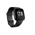 Black smartwatch with heart rate monitoring and sleep tracking on wrist