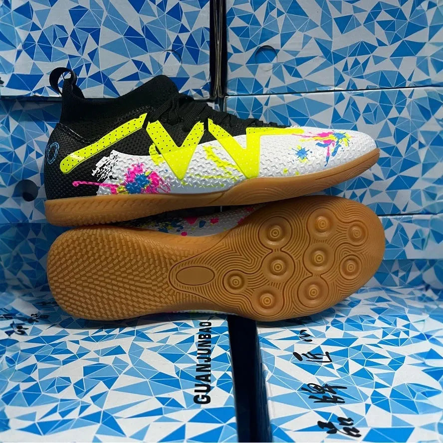 Football boots with removable moulded studs in black and yellow colour option