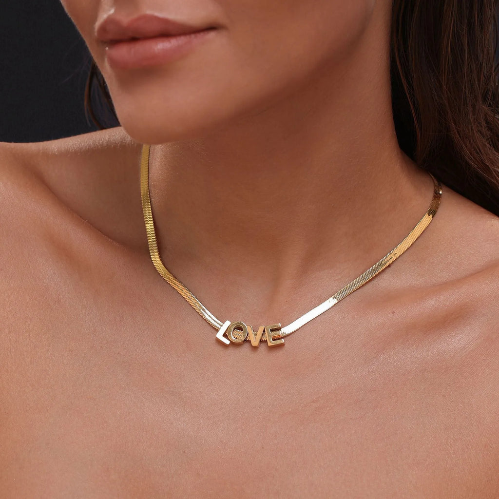 Gold electroplated titanium steel necklace with letter A charm on 40cm chain