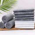 Pack of white pet urinal pads showing layered construction and multiple sizes for dogs and cats.