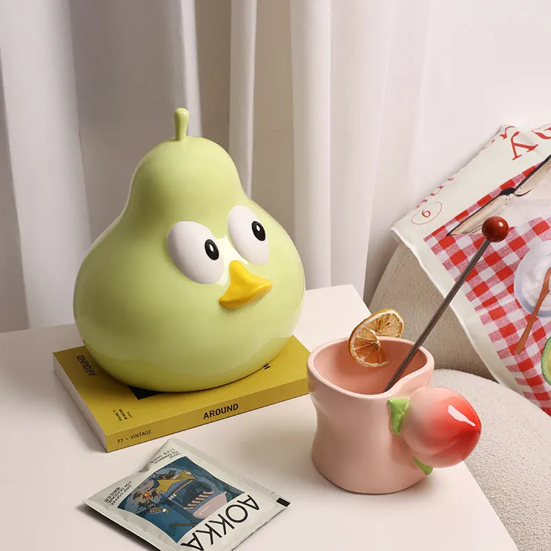 Ceramic pear-shaped tissue box in black or green for living room or desktop use