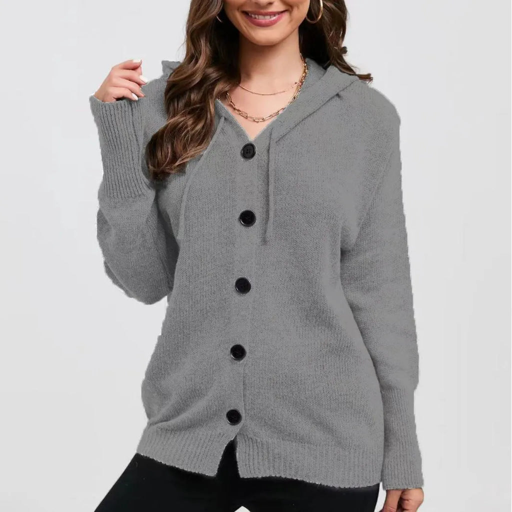 Women's loose-fit hooded cardigan sweater in a solid colour with a 3D textured pattern.