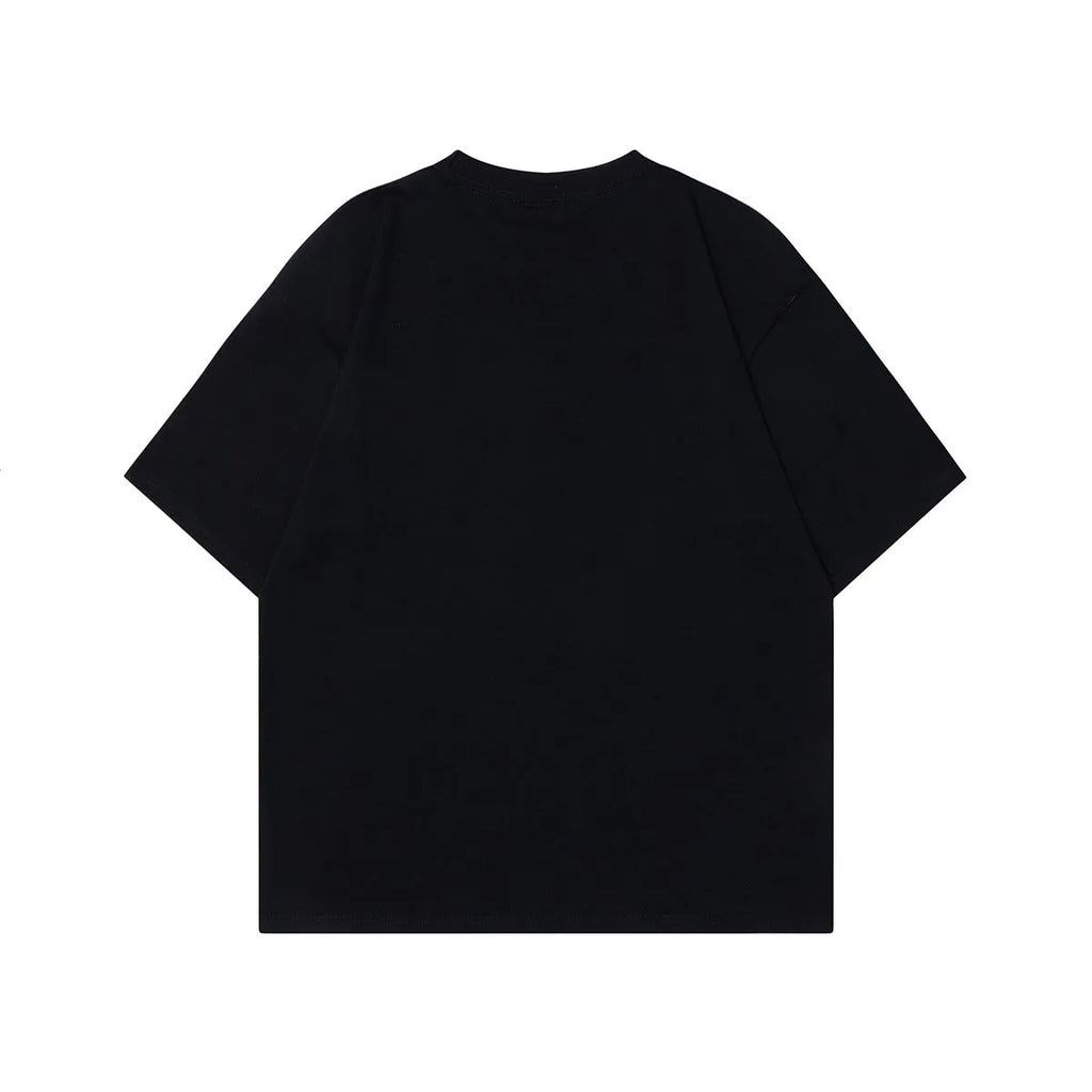 Men's loose-fit grey cotton T-shirt featuring a retro graphic character print on the chest.