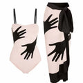 Women's one-piece bikini swimsuit with attached white tulle skirt on a mannequin.