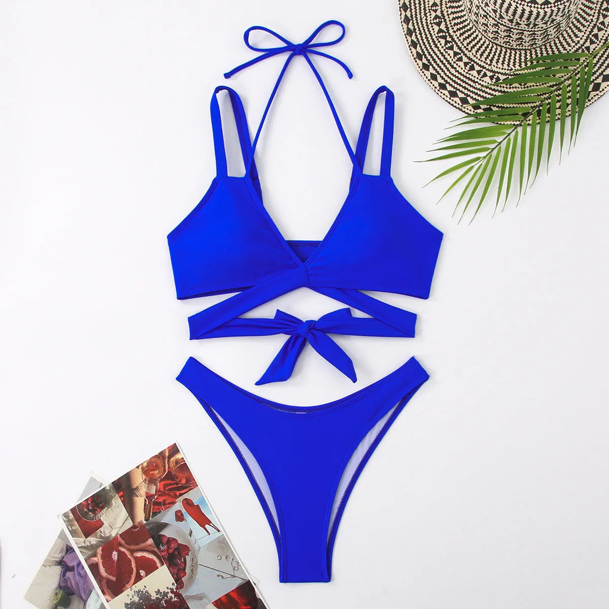 Solid colour women's strap bikini swimsuit on a hanger, shown in one of five colour options.