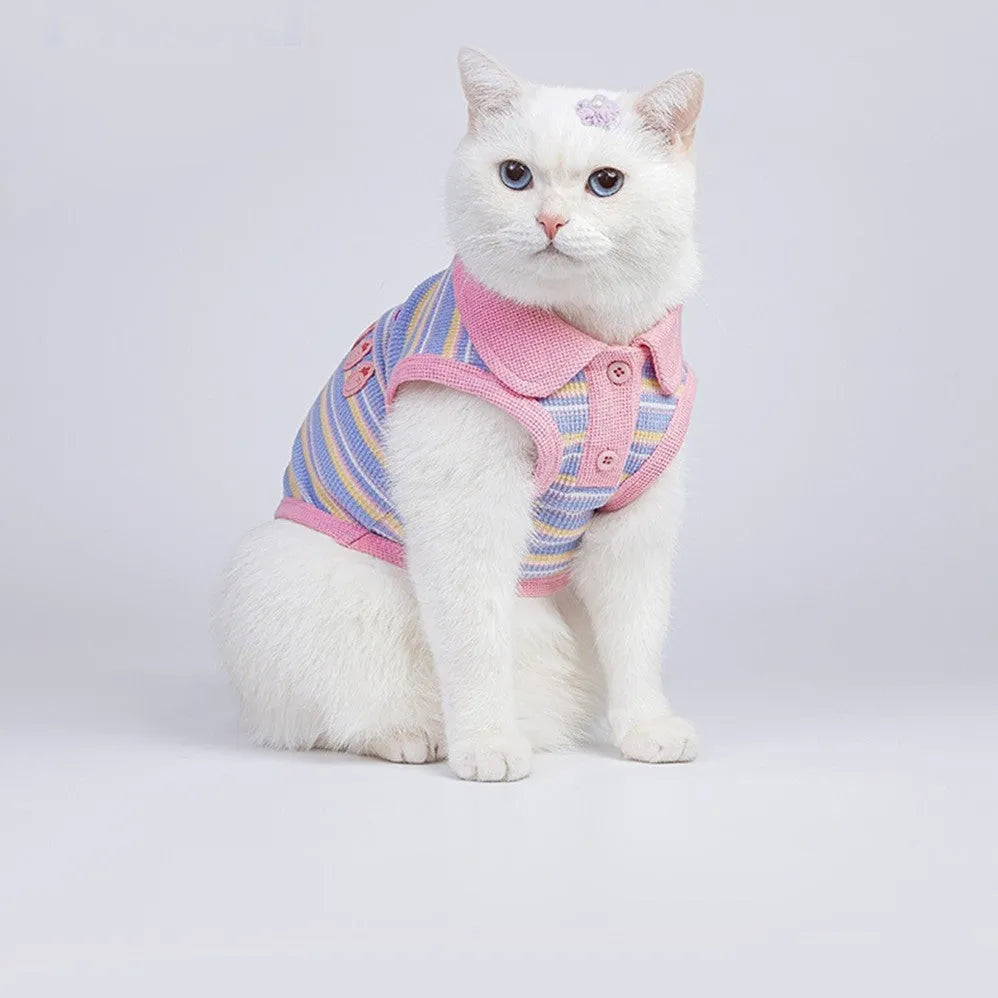 Pink purple vest for a small dog or cat, shown on a mannequin, with a size chart for pets 1.5kg to 14kg.
