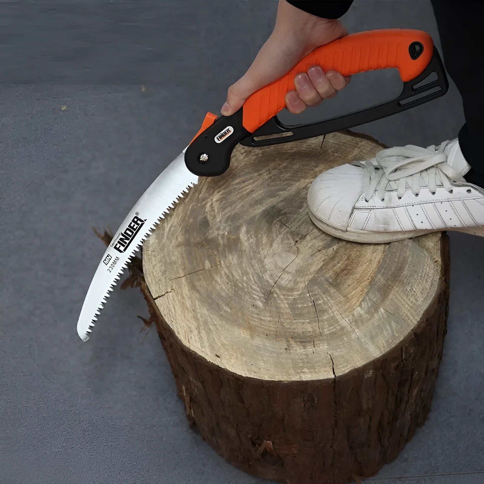 Garden folding saw with 9-inch 65MN steel blade and TPR grip shown in open position