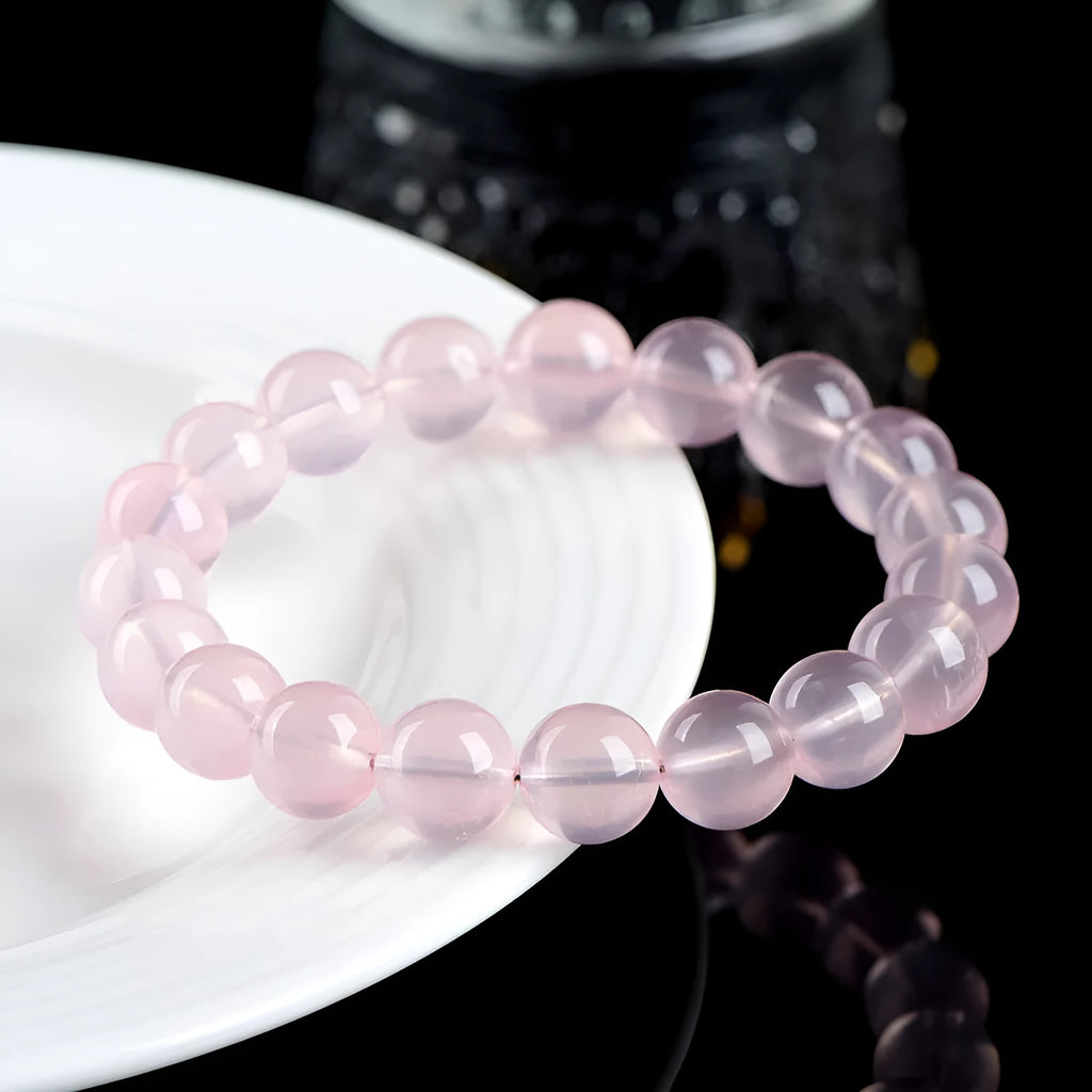 Natural starlight crystal round beads women's bracelet in pink with polished finish and multiple bead size options
