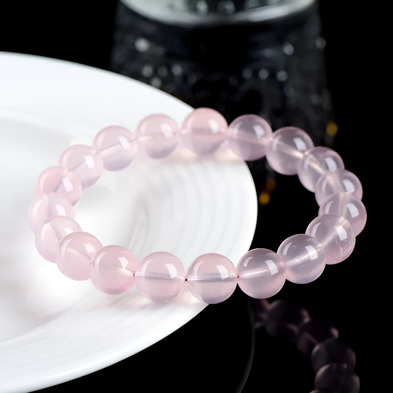 Natural starlight crystal round beads women's bracelet in pink with polished finish and multiple bead size options