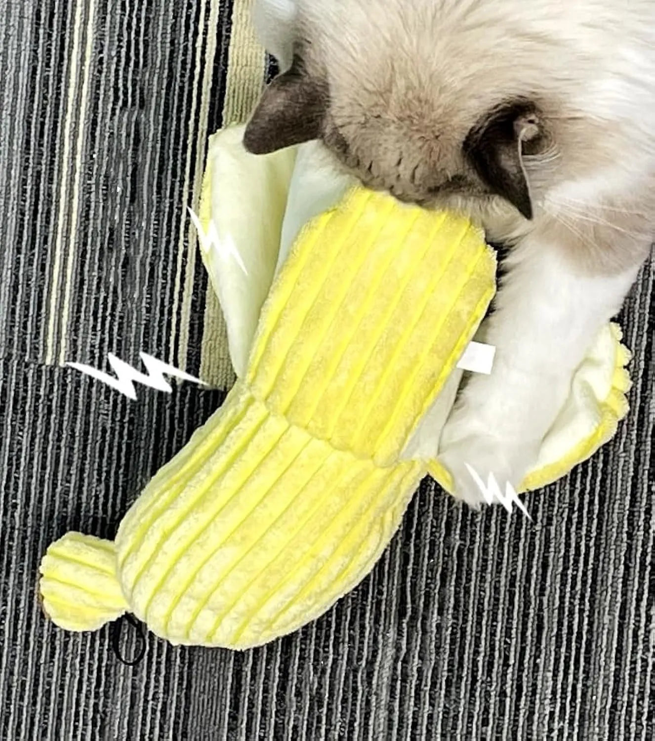 Yellow banana shaped plush cat toy with crinkle sound paper inside.