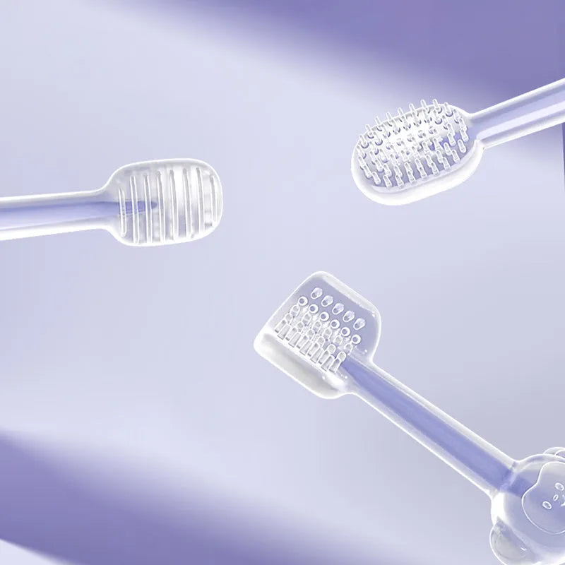 Soft silicone pet toothbrush for dogs and cats in blue, green, and purple colours for cleaning teeth and reducing bad breath.