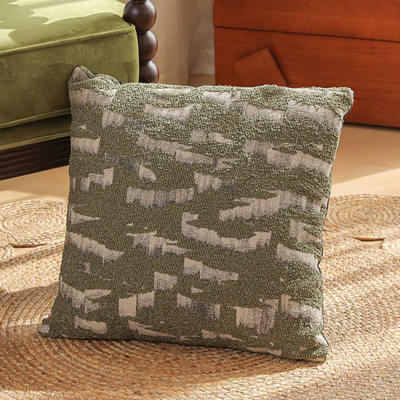 Close-up of a retro floral jacquard cushion cover in a choice of colours, showing texture and zip detail.