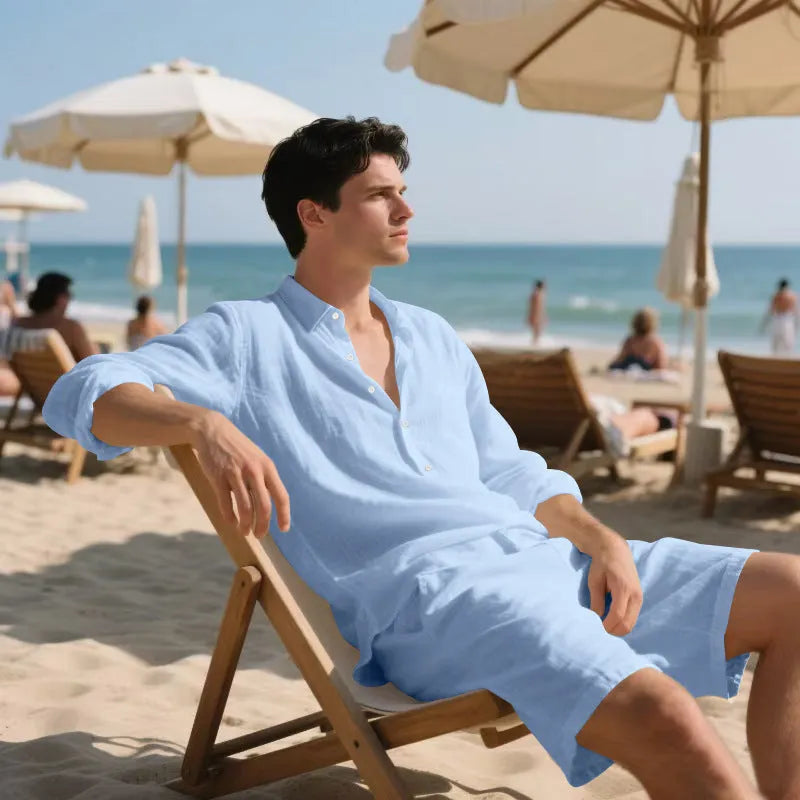 Men's linen long sleeve shirt and shorts beach suit set on a hanger, shown in a light blue colour.