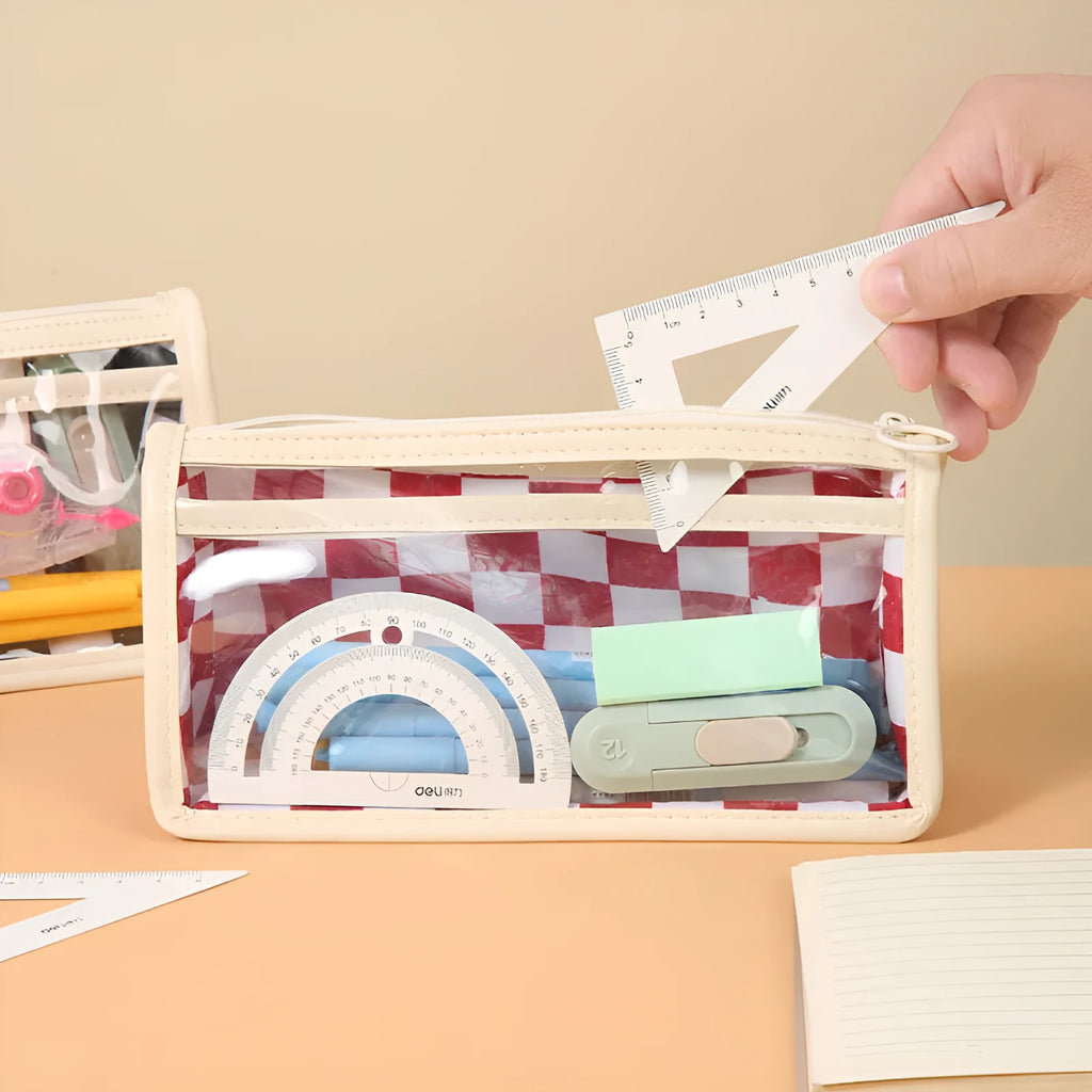 Transparent PVC pencil case with chessboard grid pattern showing pens inside