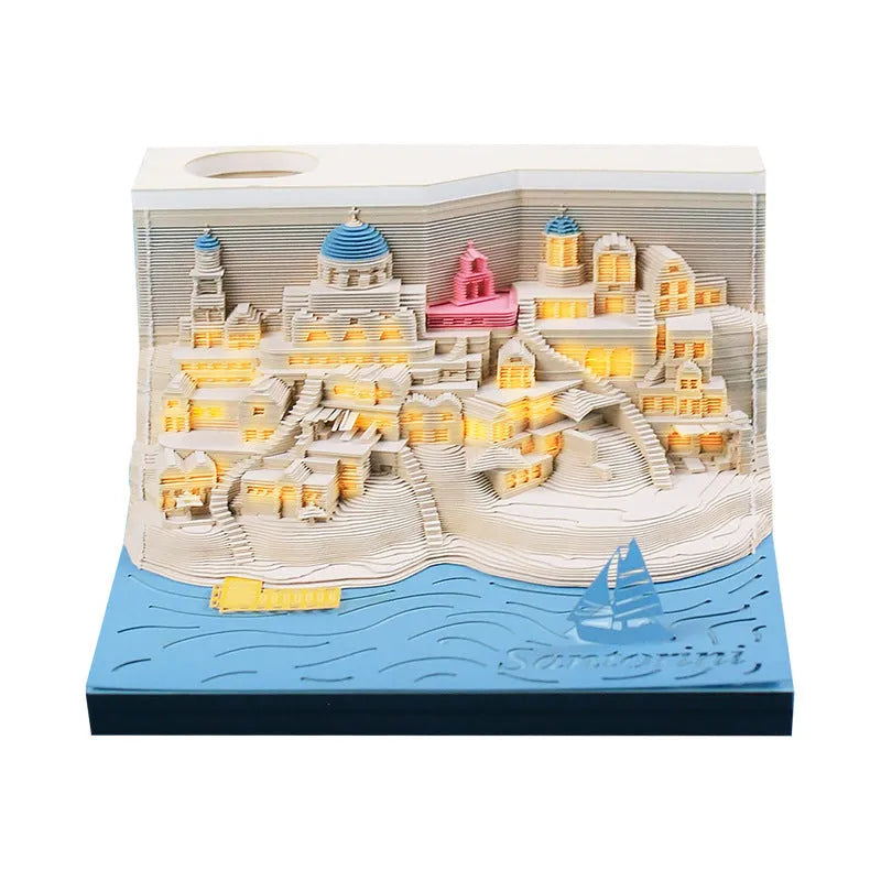Romantic Santorini 3D notepad paper carving building model with lighting on desk