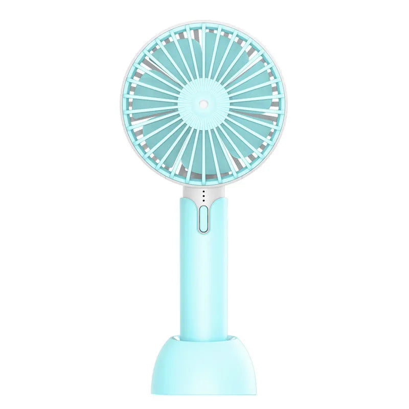 Blue handheld mini USB fan with three speed settings on a desktop