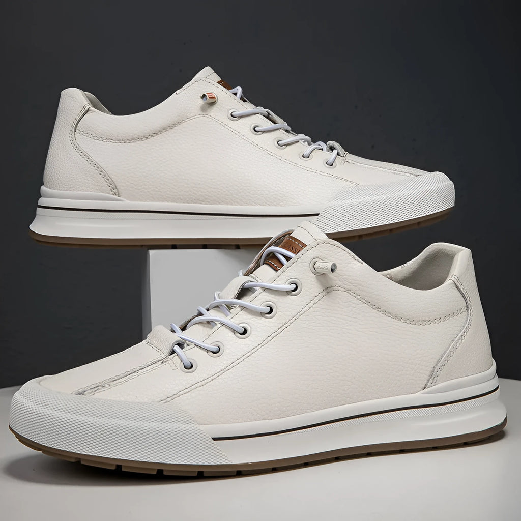 Men's white and black matte leather casual shoes with flat heel and round toe.