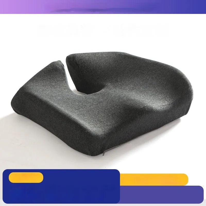 Memory foam office chair cushion with waist support in grey colour on wooden chair