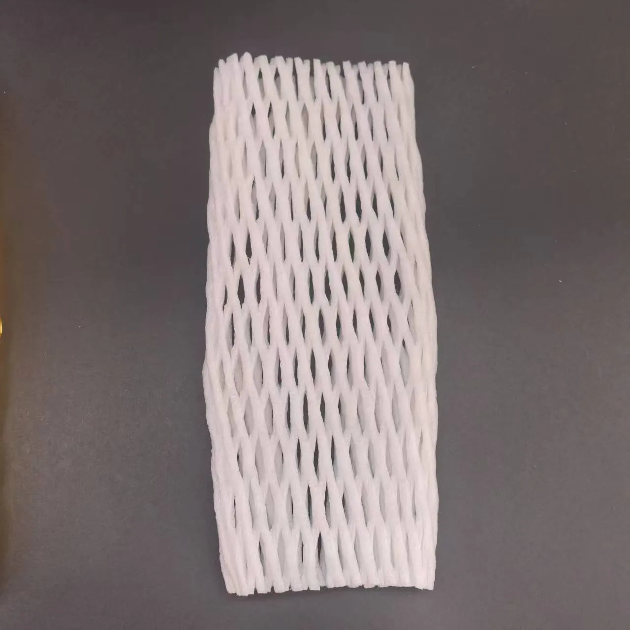 White foam fruit net cover shown in various sizes for protective wrapping.