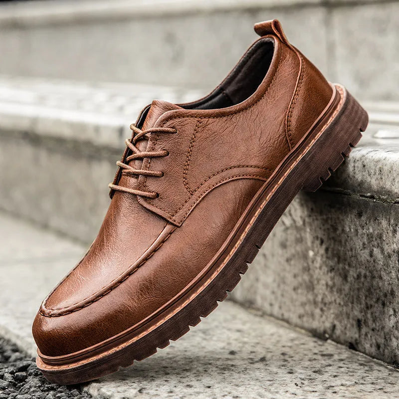 Casual leather shoes in black and brown with round toe design and rubber soles