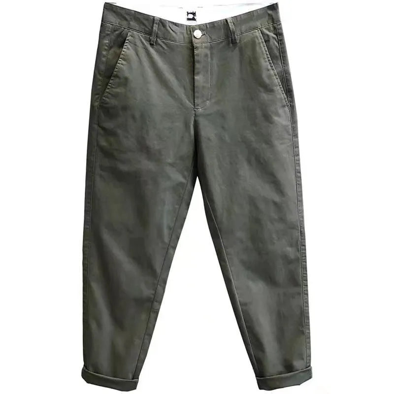 Men's cropped pure cotton casual pants in green, with mid waist and zipper fly.