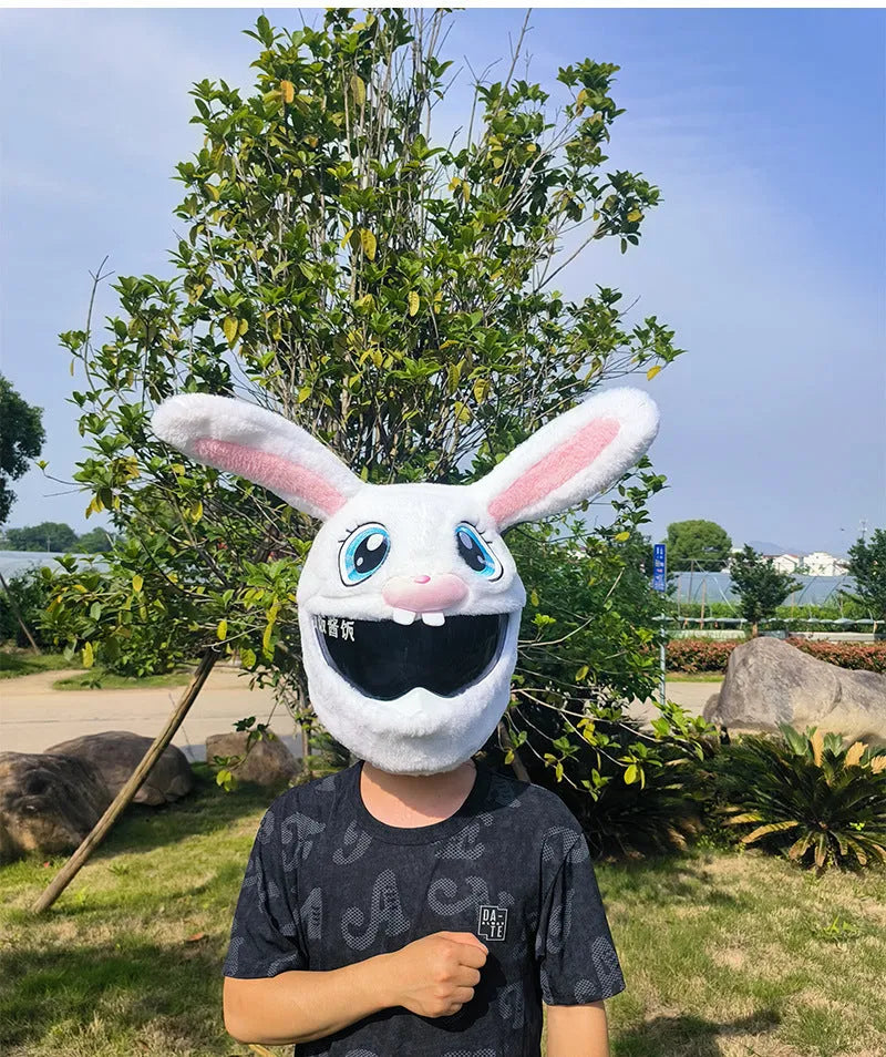Long eared white rabbit plush cover on an electric motorcycle helmet.