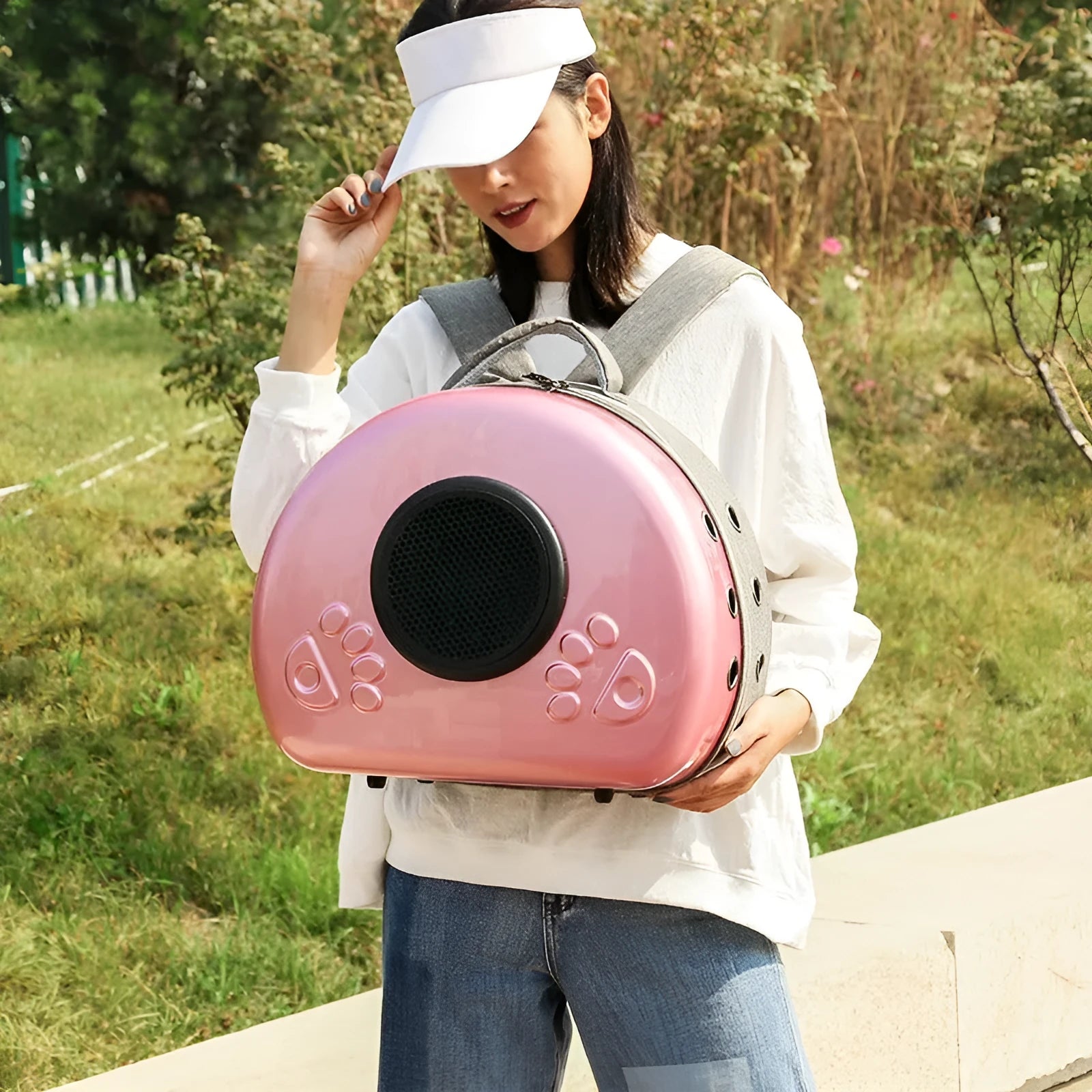 Transparent space capsule cat carrier backpack in PC canvas with metallic hard shell cover.