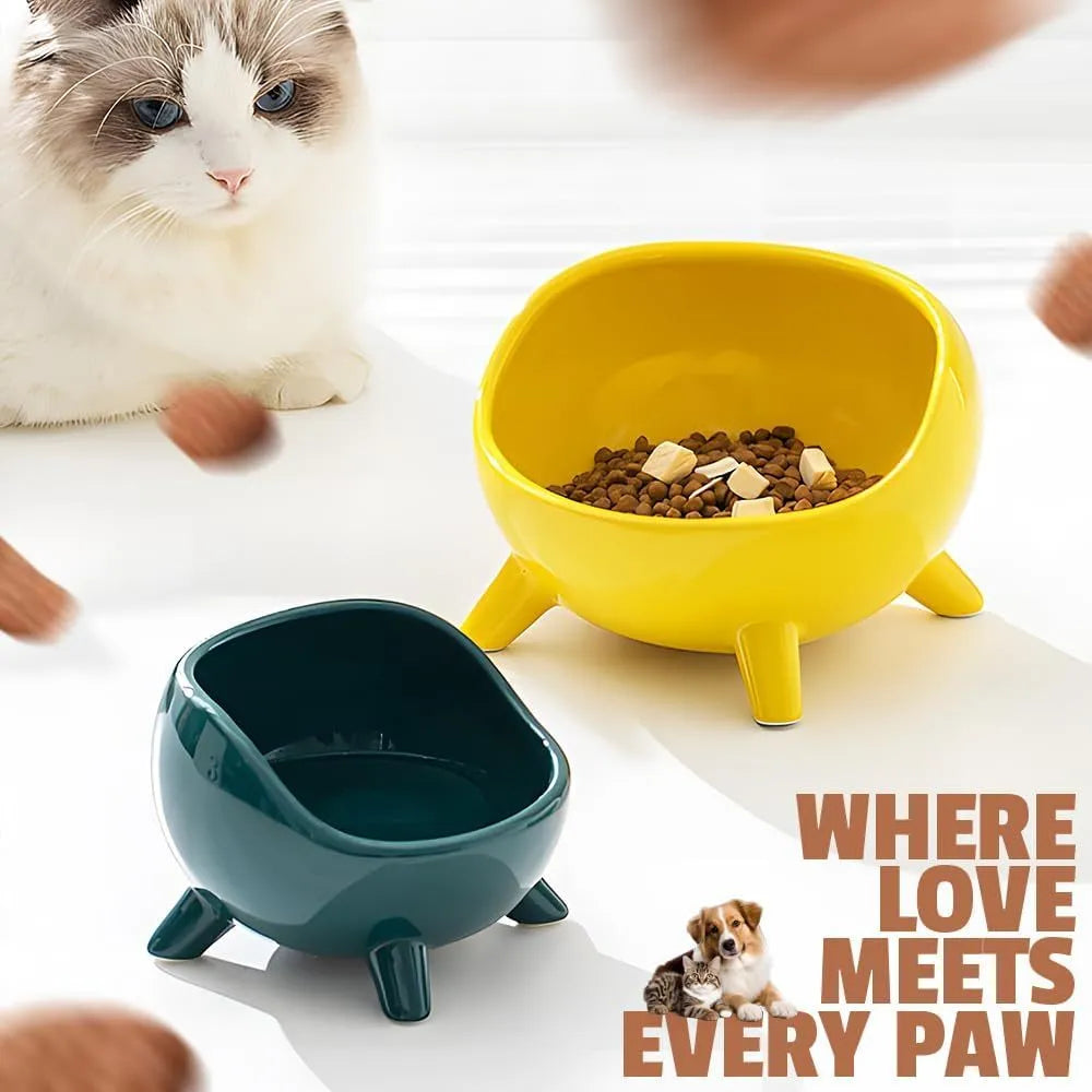 Green ceramic pet food bowl with four stabilising legs and wide opening