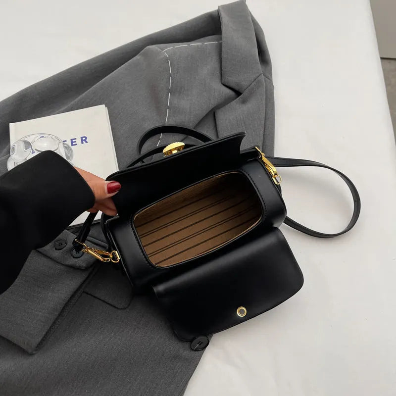 Women's black PU leather messenger bag with personalised letter stitching detail