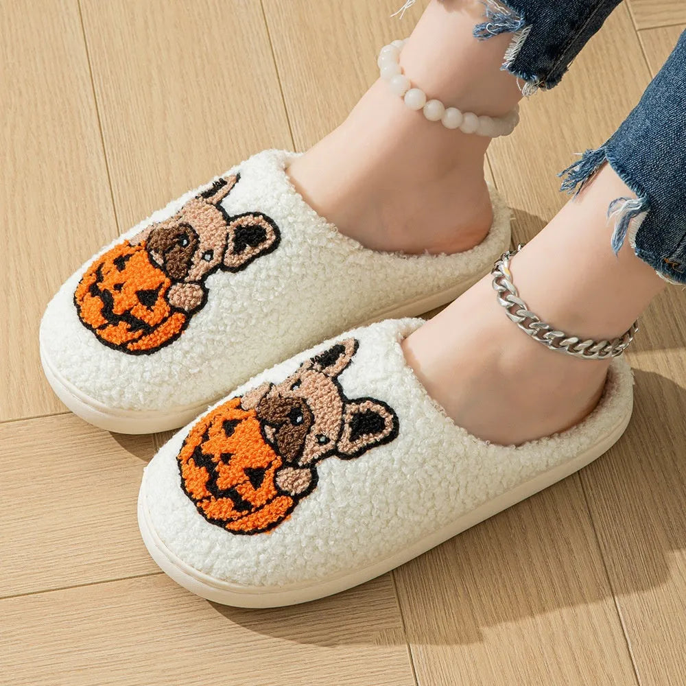 Black and white Halloween pumpkin slippers with plush upper and non-slip TPR soles