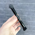Black sponge stick concealer brush with wooden handle for dark circle makeup application