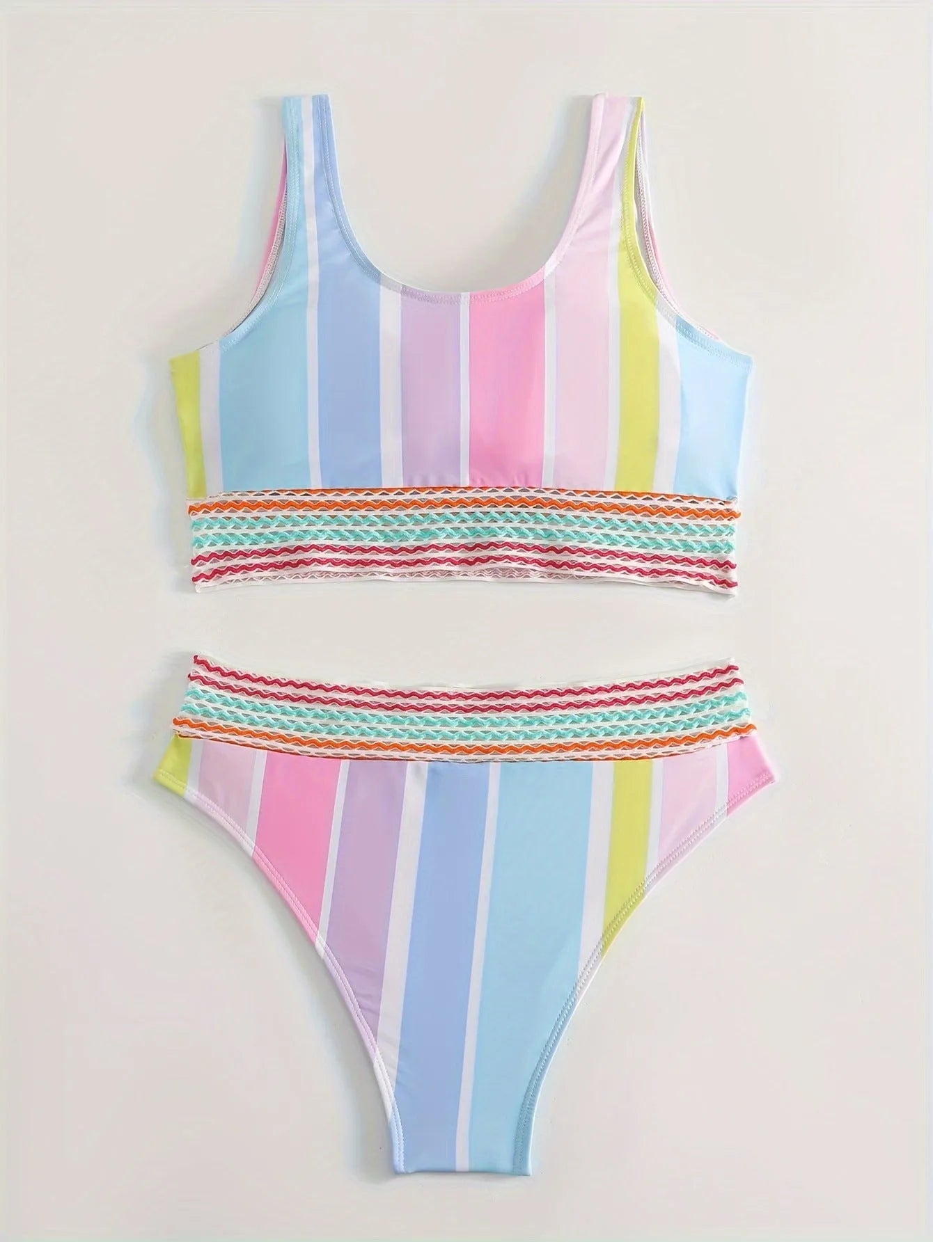 Women's striped sport bikini set with briefs style top and pants for swimming.