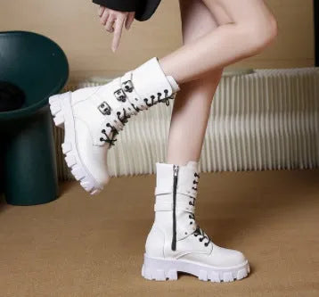 Women's black mid-calf boots with metal buckle decoration and side zipper, rounded toe design