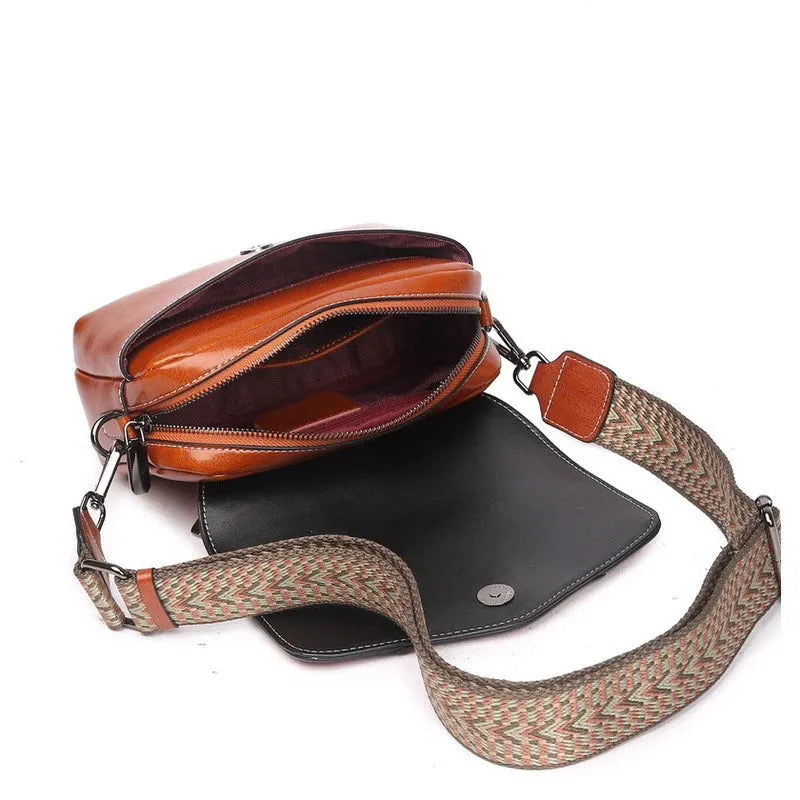 Top grain leather crossbody bag for women in caramel colour with zip closure and patchwork design