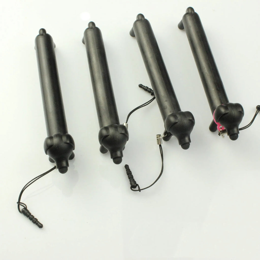 Black dog-shaped touch screen stylus showing length adjustment and phone stand functionality