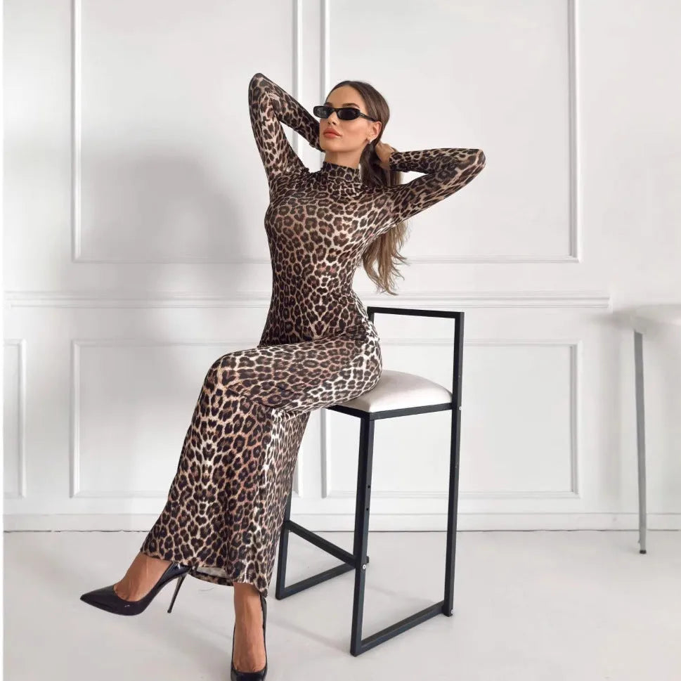 Leopard print long sleeve dress with stand collar and high-waisted knee-length skirt.